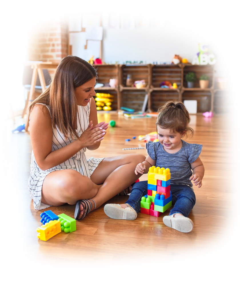 A childcare educator engaging with a child in creative play at an early learning centre in Perth, promoting development at top childcare centres in Perth.