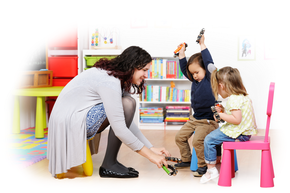 A childcare educator engaging with children in a play-based learning activity at an early learning centre in Perth.